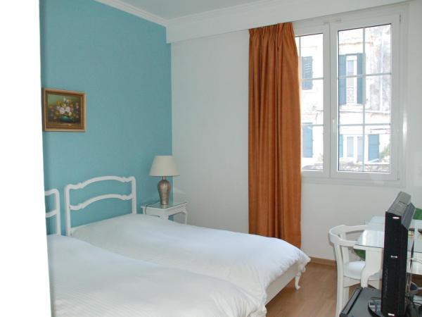 City Marina : photo 4 de la chambre chambre triple Économique avec lit d'appoint