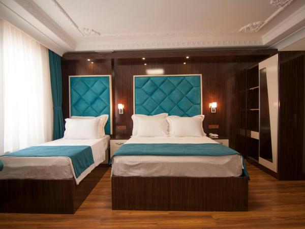 Akbiyik Suite Boutique Hotel : photo 4 de la chambre chambre triple supérieure