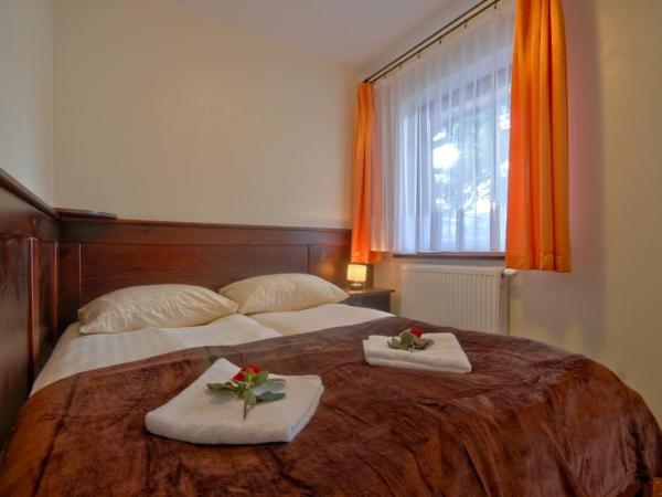 Willa Na Szczycie : photo 4 de la chambre chambre triple avec salle de bains privative