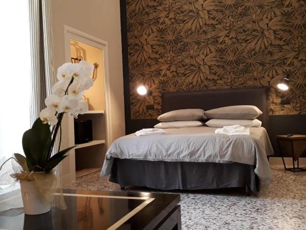 MammaDada charm rooms : photo 5 de la chambre chambre double deluxe avec lit d'appoint