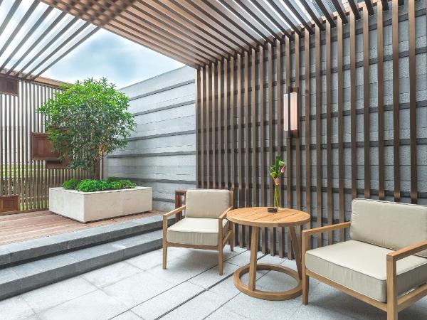 Grand Hyatt Hangzhou : photo 1 de la chambre chambre lit king-size avec jardin