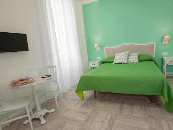 Il Gioiellino Art : photo 8 de la chambre chambre quadruple supérieure