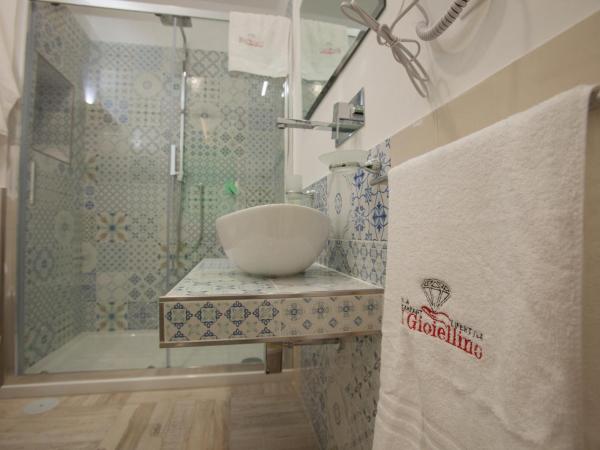 Il Gioiellino Art : photo 6 de la chambre chambre quadruple supérieure
