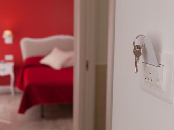 Il Gioiellino Art : photo 2 de la chambre chambre triple supérieure