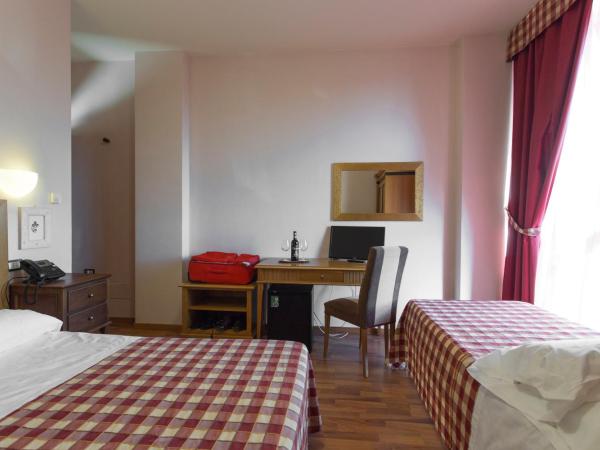 Hotel Il Giardino : photo 7 de la chambre chambre triple