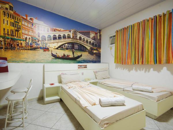 Mirage Motel Guarulhos : photo 2 de la chambre chambre lits jumeaux Économique