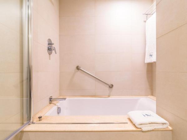 Eurostars Zona Rosa Suites : photo 7 de la chambre chambre triple