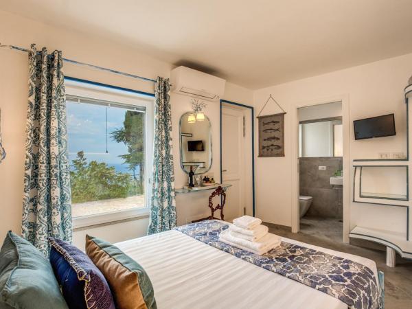 VILLA OLGA LUXURY CAPRI : photo 7 de la chambre chambre simple de luxe - vue sur mer