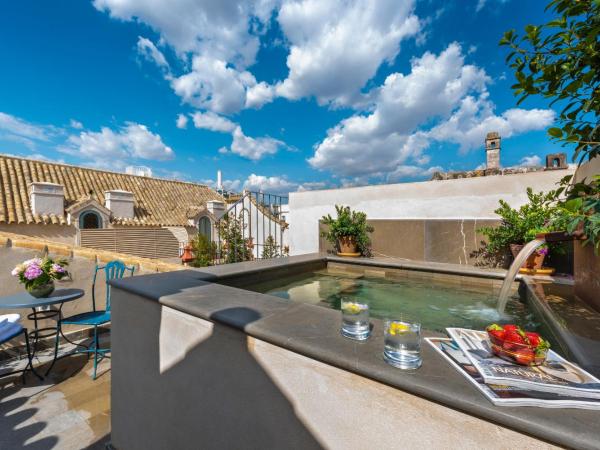 Palacio Bucarelli : photo 3 de la chambre penthouse avec terrasse et petite piscine