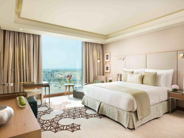 Grand Millennium Muscat : photo 1 de la chambre chambre lit king-size deluxe