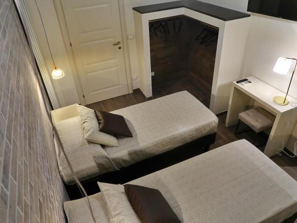 Maglo Station : photo 2 de la chambre chambre lits jumeaux avec terrasse