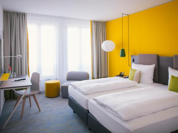 Vienna House Easy by Wyndham Leipzig : photo 2 de la chambre chambre confort accessible aux personnes à mobilité réduite