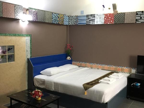 Wiang Kum Kam Resort : photo 1 de la chambre suite familiale