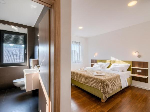 Rooms K&T sea side luxury : photo 5 de la chambre chambre double