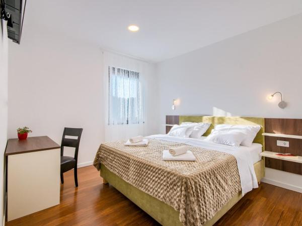 Rooms K&T sea side luxury : photo 8 de la chambre chambre double