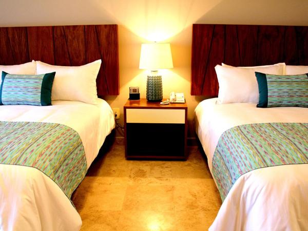 Las Villas Hotel & Golf By Estrella del Mar : photo 3 de la chambre 2 queens garden view