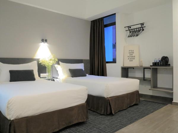 Leo Palace New Wing, WTC Kuala Lumpur : photo 3 de la chambre chambre lits jumeaux supérieure