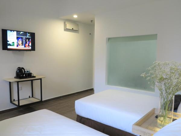 Leo Palace New Wing, WTC Kuala Lumpur : photo 4 de la chambre chambre lits jumeaux supérieure