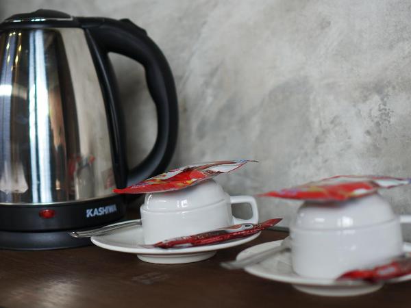 Rumpai Loft Habitat : photo 2 de la chambre chambre triple avec salle de bains privative