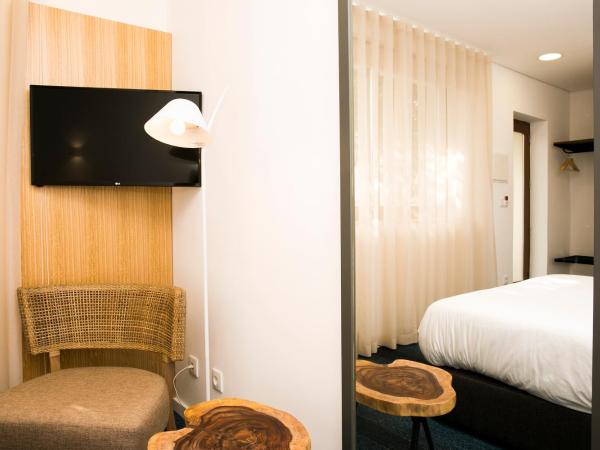 BO - Álvares Cabral GuestHouse : photo 6 de la chambre chambre double - vue sur jardin