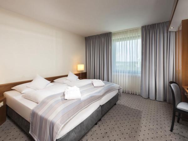 Maritim Airport Hotel Hannover : photo 1 de la chambre suite junior