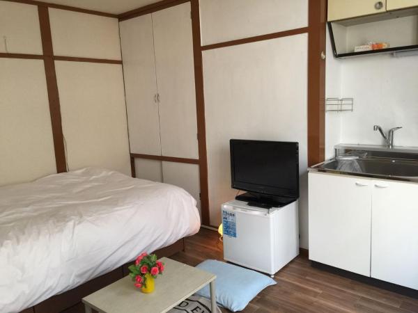 Happy Apartment : photo 4 de la chambre chambre familiale avec salle de bains privative