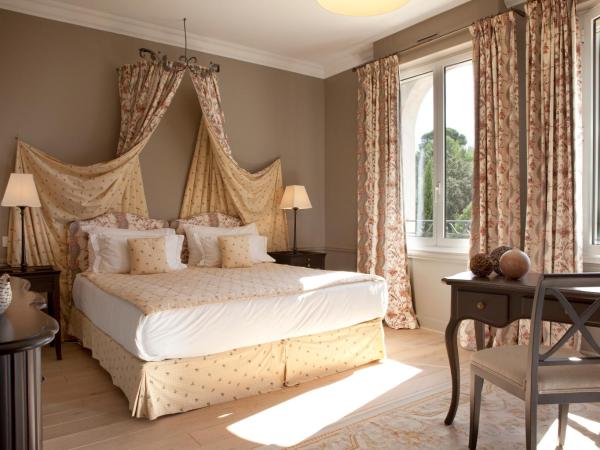 Château de Valmer : photo 1 de la chambre suite junior - vue sur piscine ou palmeraie 
