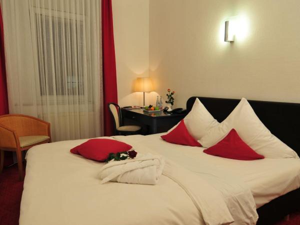 Cerano City Hotel Köln am Dom : photo 2 de la chambre chambre triple