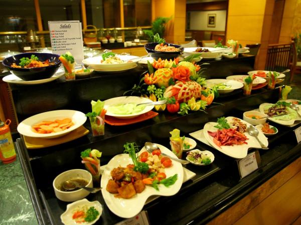 Gokulam Park : photo 1 de la chambre chambre double ou lits jumeaux supérieure