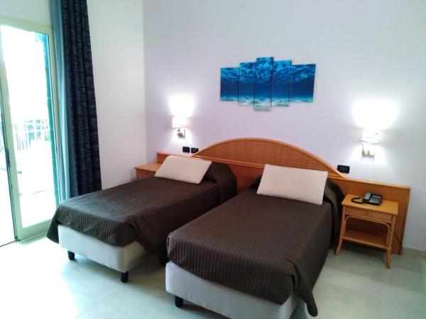 Hotel Corallo : photo 3 de la chambre chambre quadruple supérieure 