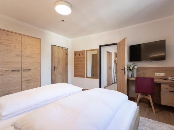 Isserwirt : photo 4 de la chambre chambre familiale (2 adultes et 2 enfants)