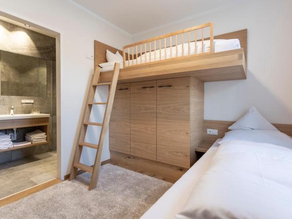 Isserwirt : photo 3 de la chambre chambre familiale (2 adultes et 2 enfants)