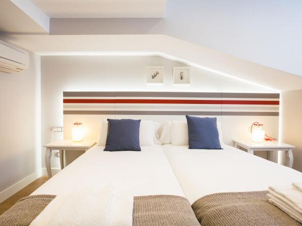 Legazpi Doce Rooms & Suites : photo 10 de la chambre appartement de grand standing avec terrasse