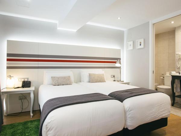 Legazpi Doce Rooms & Suites : photo 6 de la chambre appartement de grand standing avec terrasse