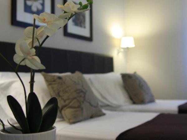 Delle Vittorie Luxury Rooms&Suites : photo 8 de la chambre chambre lits jumeaux standard