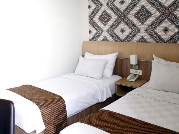 D'Kalpa Hotel Demangan Yogyakarta : photo 2 de la chambre chambre lits jumeaux