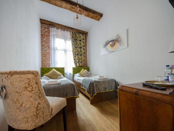 Apartamenty Mieszczańskie u Gołębiewskich : photo 8 de la chambre chambre lits jumeaux spacieuse