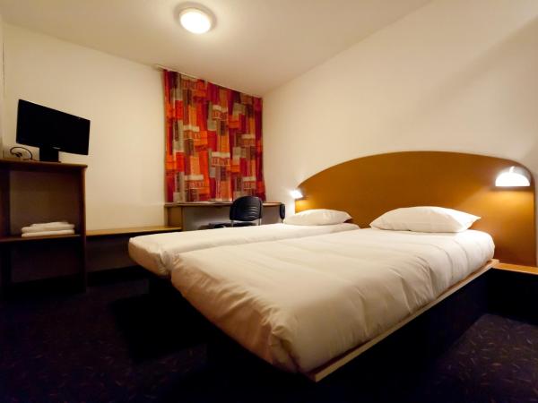 Quick Palace Pau Zénith : photo 6 de la chambre chambre lits jumeaux