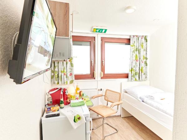 Aparthotel Marion Weber : photo 2 de la chambre petite chambre simple avec salle de bains