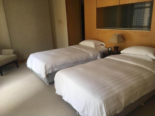 Dalian Asia Pacific Service Apartment (Former Somerset Harbour Court Dalian) : photo 8 de la chambre suite lits jumeaux exécutive 1 chambre