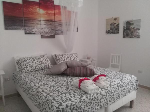 TORRE ANGELLARA B&B : photo 6 de la chambre chambre double ou lits jumeaux avec salle de bains privative externe