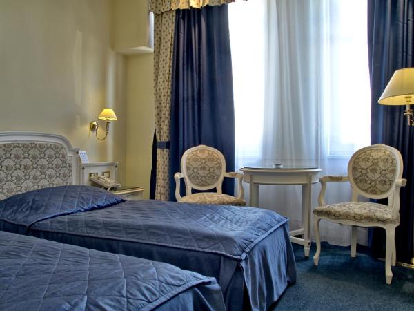 Ambassador Zlata Husa : photo 5 de la chambre chambre lits jumeaux