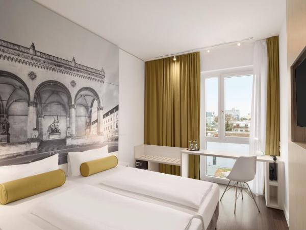 Super 8 by Wyndham Munich City North : photo 7 de la chambre chambre double standard