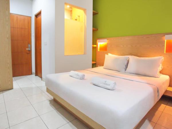 LeGreen Suite Senayan : photo 3 de la chambre chambre double supérieure