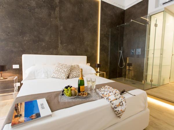 Palermo In Suite Aparthotel : photo 3 de la chambre appartement avec douche