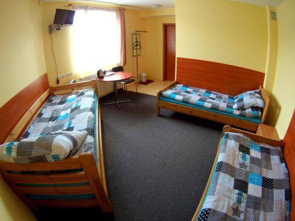 Noclegi Wega : photo 2 de la chambre chambre quadruple