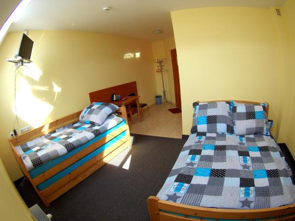 Noclegi Wega : photo 2 de la chambre chambre quadruple