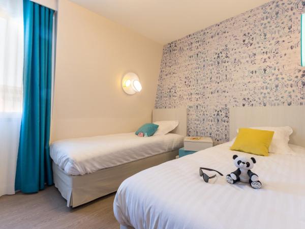 Résidence Pierre & Vacances Premium Presqu'Ile de la Touques : photo 2 de la chambre appartement 2 chambres en duplex avec terrasse ou balcon (6 personnes) - bâtiments de la capitainerie