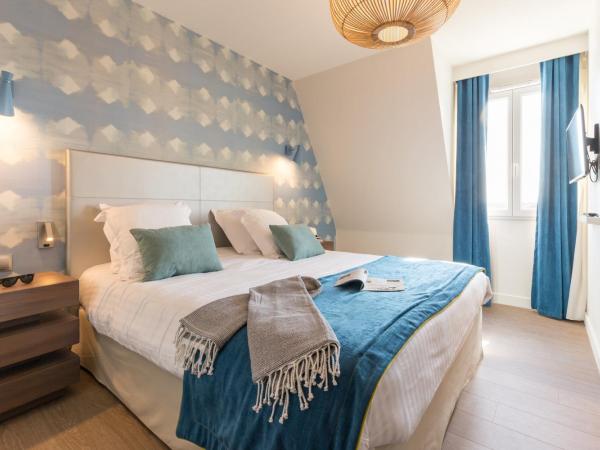 Résidence Pierre & Vacances Premium Presqu'Ile de la Touques : photo 3 de la chambre appartement 2 chambres en duplex avec terrasse ou balcon (6 personnes) - bâtiments de la capitainerie