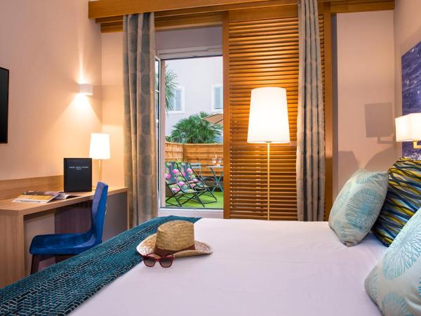 Hotel Beau Rivage : photo 1 de la chambre chambre de luxe avec terrasse